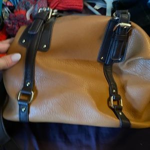 Charlie Charmings handbag never used comes with a detachable strap.
